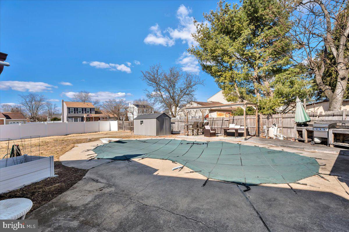 52 Borrelly Boulevard Sewell, NJ 08080 - Photo 23 of 24 a view of a swimming pool with a lounge chairs