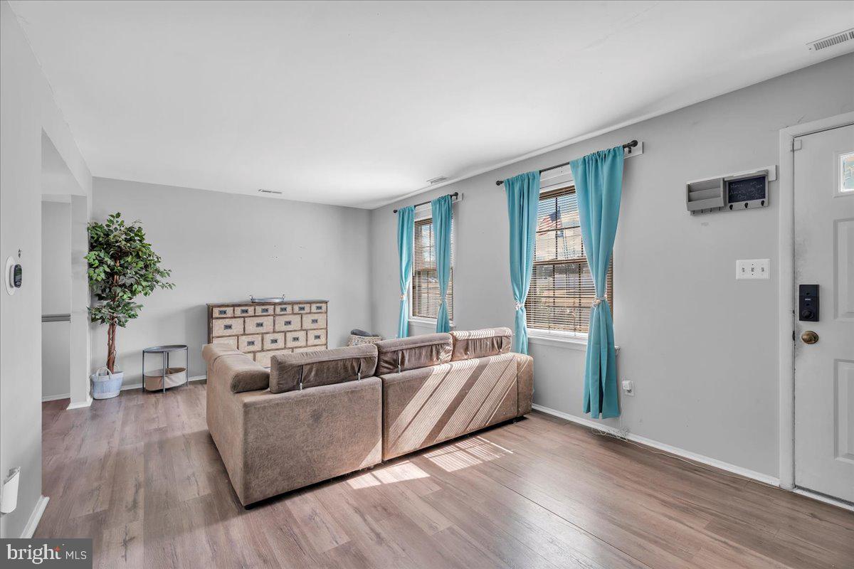 52 Borrelly Boulevard Sewell, NJ 08080 - Photo 3 of 24 a living room with furniture and a wooden floor