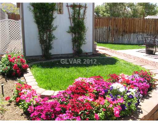 355 West Basic Road Henderson, NV 89015 - Photo 12 of 12 Exterior Back. beautiful flower garden