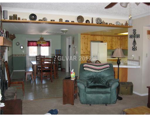 355 West Basic Road Henderson, NV 89015 - Photo 3 of 12 Living Room. Living room with kitchen and dining view