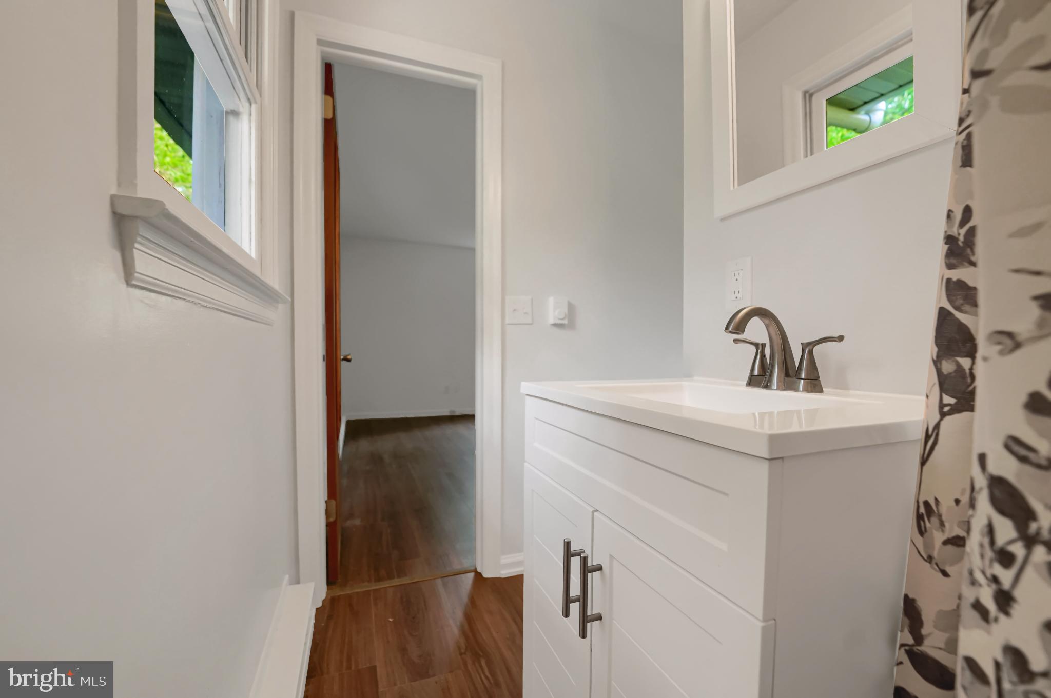 719 Glenn Road State College, PA 16803 - Photo 12 of 26 Bright and modern bathroom with sleek finishes.