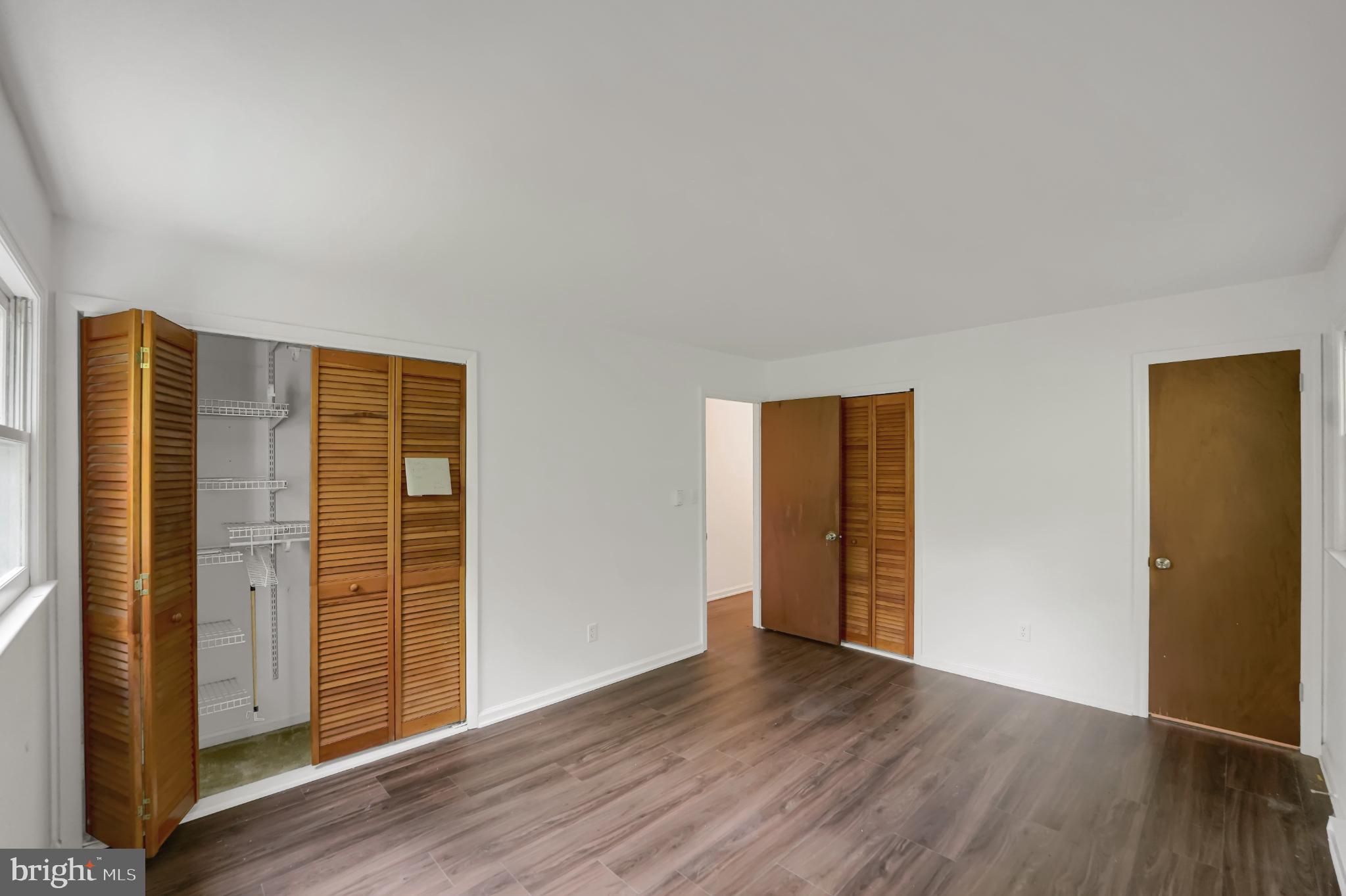 719 Glenn Road State College, PA 16803 - Photo 9 of 26 Spacious room with warm wooden accents.