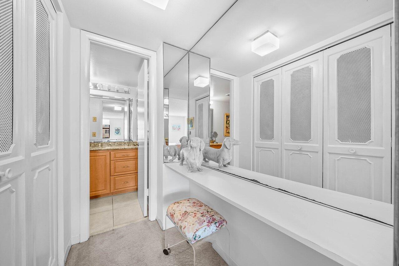 3460 South Ocean Boulevard, Unit 6150 Palm Beach, FL 33480 - Photo 14 of 34 a spacious bathroom with a double vanity sink a mirror and a shower