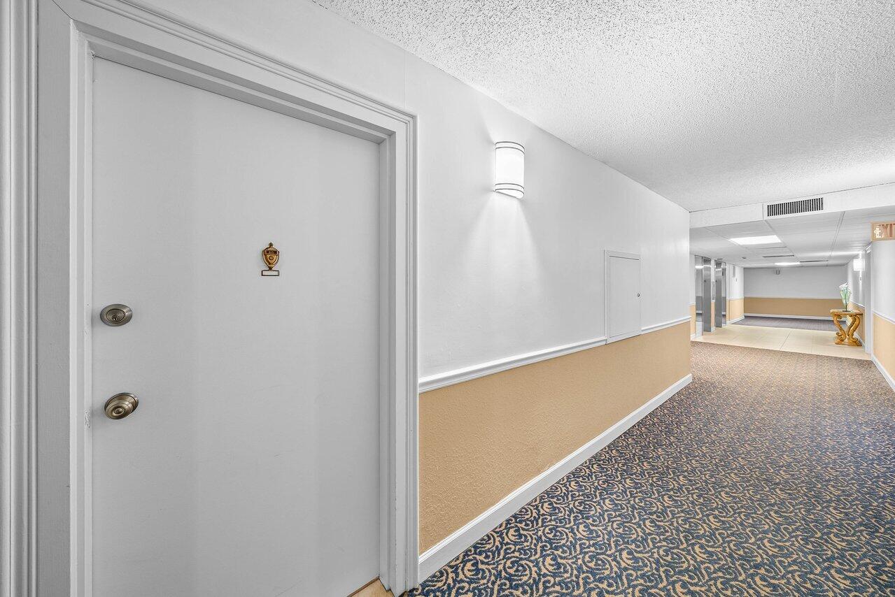 3460 South Ocean Boulevard, Unit 6150 Palm Beach, FL 33480 - Photo 2 of 34 a view of an empty room and a window