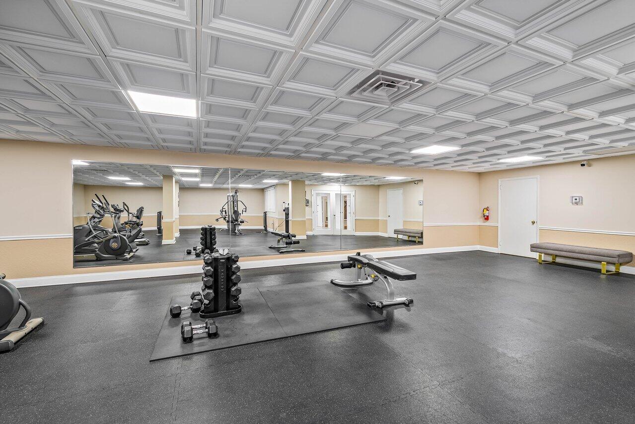 3460 South Ocean Boulevard, Unit 6150 Palm Beach, FL 33480 - Photo 28 of 34 a view of a room with gym equipment