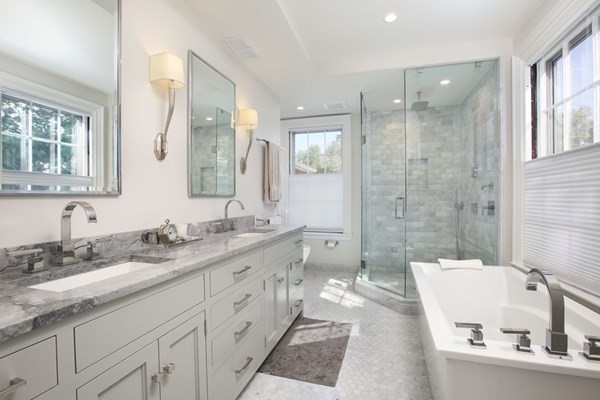 45 Orchard Street, Unit 1 Boston, MA 02130 - Photo 11 of 19 a bathroom with a granite countertop sink mirror and a bathtub