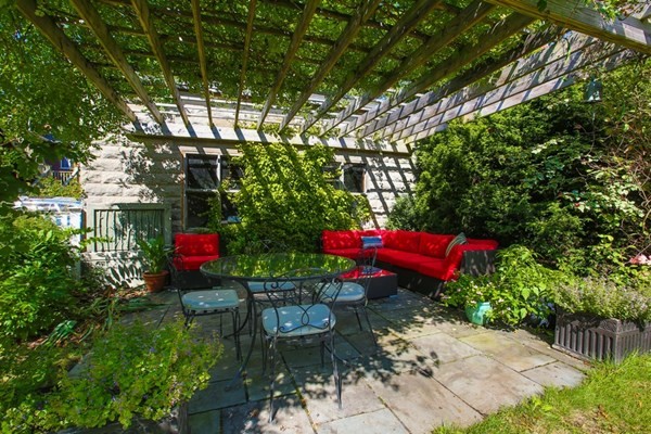 45 Orchard Street, Unit 1 Boston, MA 02130 - Photo 17 of 19 a view of a chairs and table in a garden