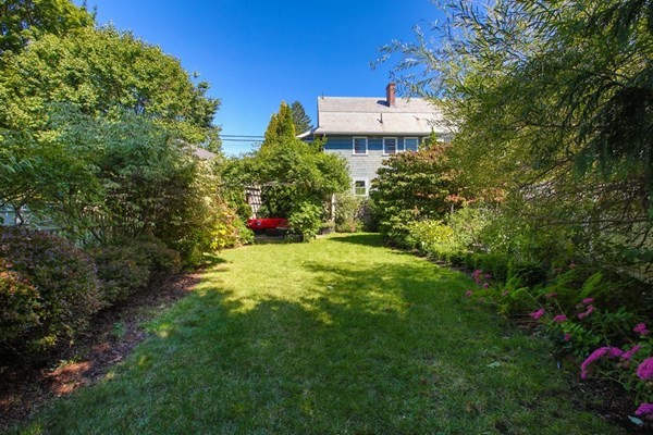 45 Orchard Street, Unit 1 Boston, MA 02130 - Photo 18 of 19 a view of a house with a yard and garden