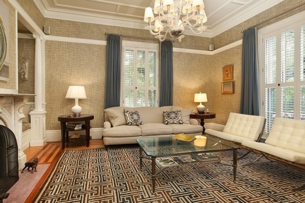 45 Orchard Street, Unit 1 Boston, MA 02130 - Photo 3 of 19 a living room with furniture a chandelier and a fireplace