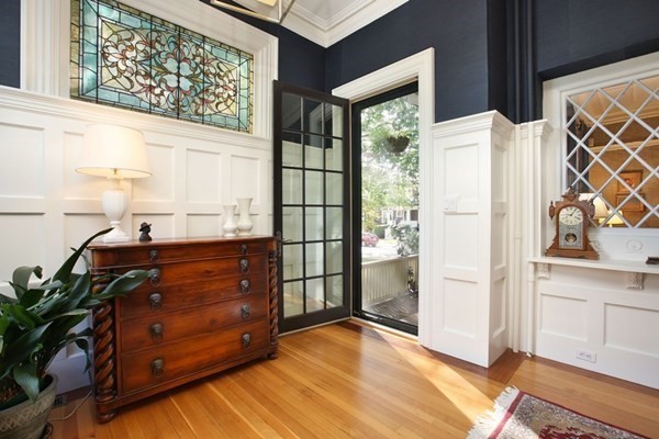 45 Orchard Street, Unit 1 Boston, MA 02130 - Photo 5 of 19 a room with windows and wooden floor