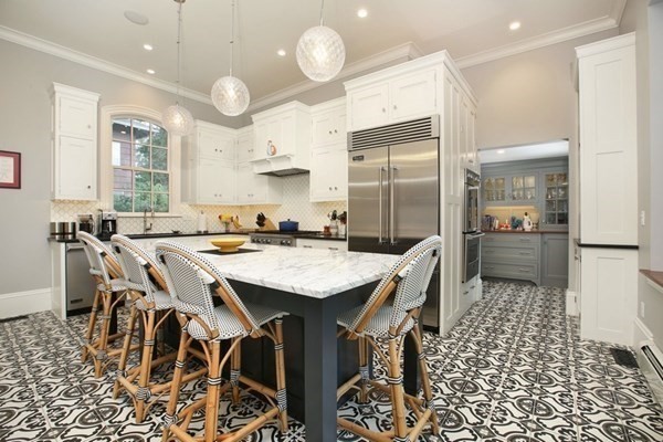 45 Orchard Street, Unit 1 Boston, MA 02130 - Photo 6 of 19 a open kitchen with a table and chairs