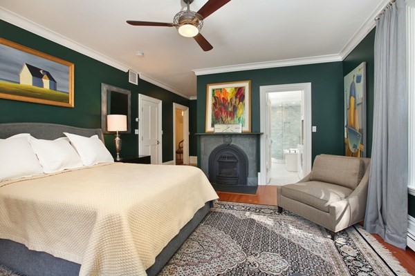 45 Orchard Street, Unit 1 Boston, MA 02130 - Photo 10 of 19 a living room with furniture and a fireplace