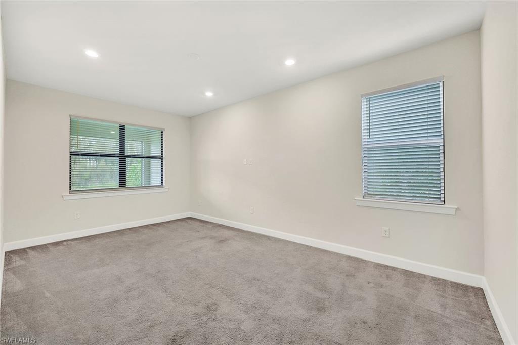 19176 Elston Way Estero, FL 33928 - Photo 14 of 26 an empty room with windows