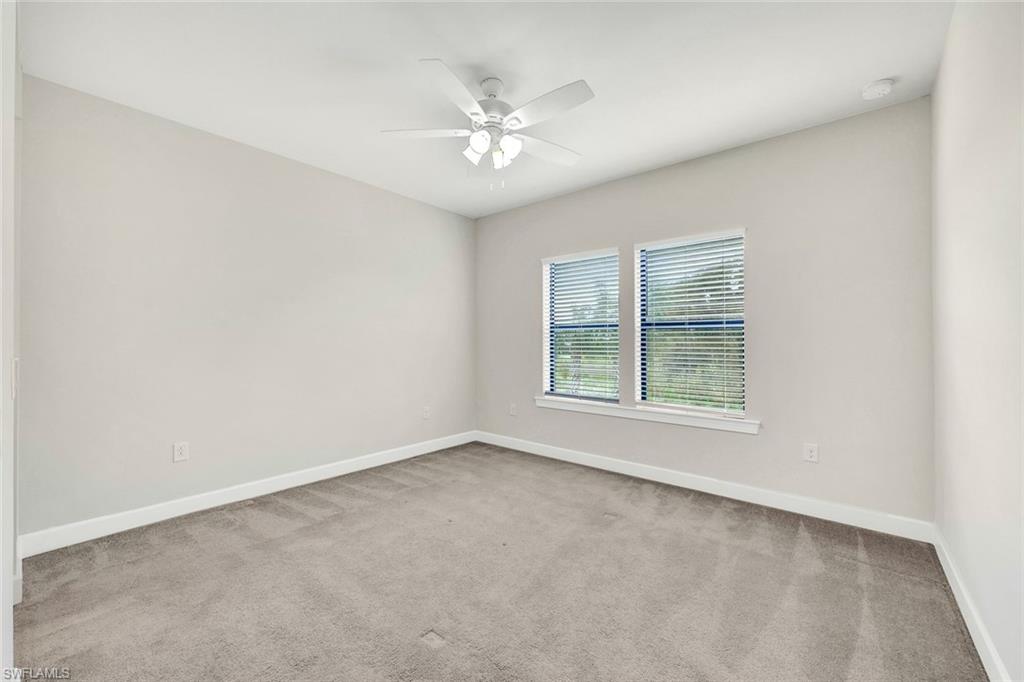19176 Elston Way Estero, FL 33928 - Photo 20 of 26 an empty room with a window
