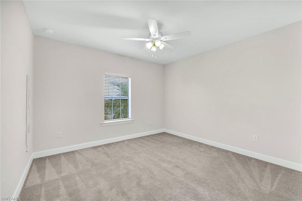 19176 Elston Way Estero, FL 33928 - Photo 22 of 26 an empty room with a window