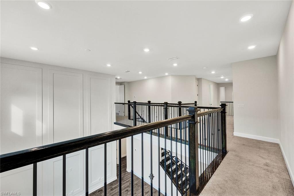 19176 Elston Way Estero, FL 33928 - Photo 10 of 26 a view of hallway with stairs