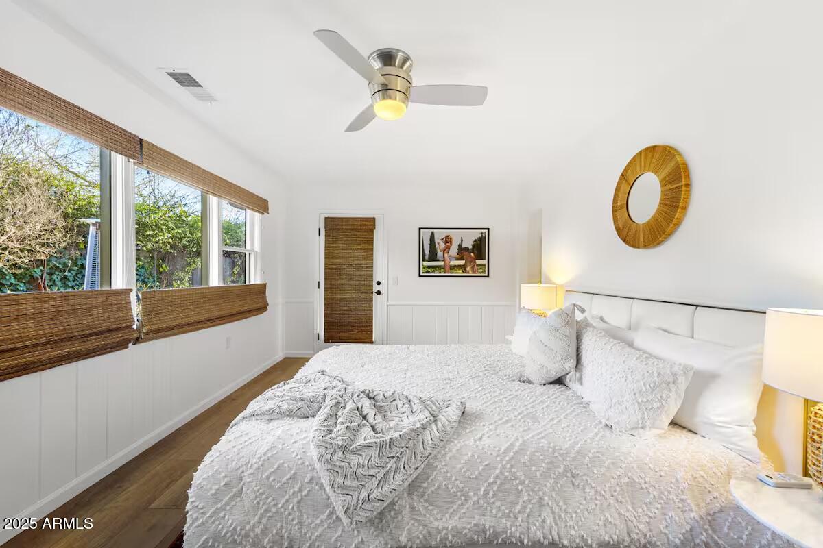 49 Prochnow Road Sedona, AZ 86336 - Photo 22 of 76 a bedroom with a large bed and a large window