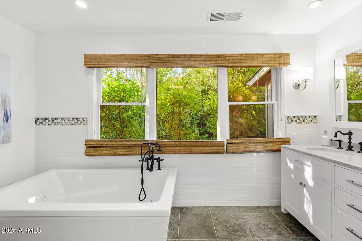 49 Prochnow Road Sedona, AZ 86336 - Photo 24 of 76 a white bath tub sitting next to a window