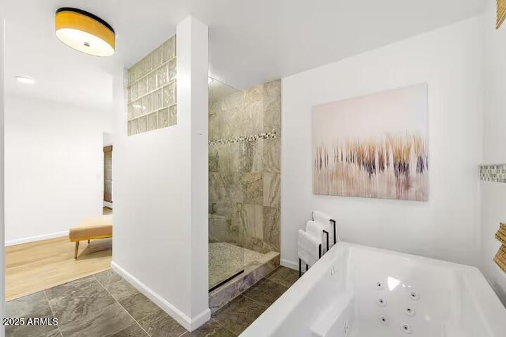 49 Prochnow Road Sedona, AZ 86336 - Photo 25 of 76 a bathroom with a bathtub and a shower