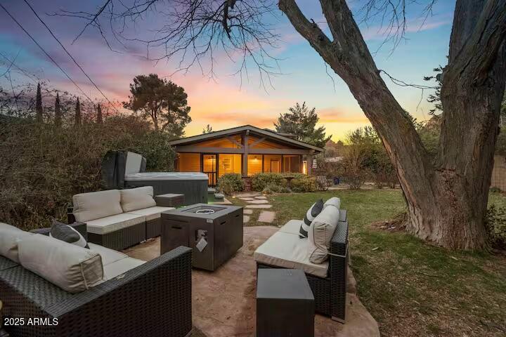 49 Prochnow Road Sedona, AZ 86336 - Photo 32 of 76 a view of backyard of house with outdoor seating