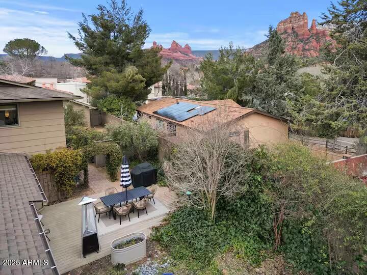 49 Prochnow Road Sedona, AZ 86336 - Photo 33 of 76 a view of a patio with table and chairs and potted plants