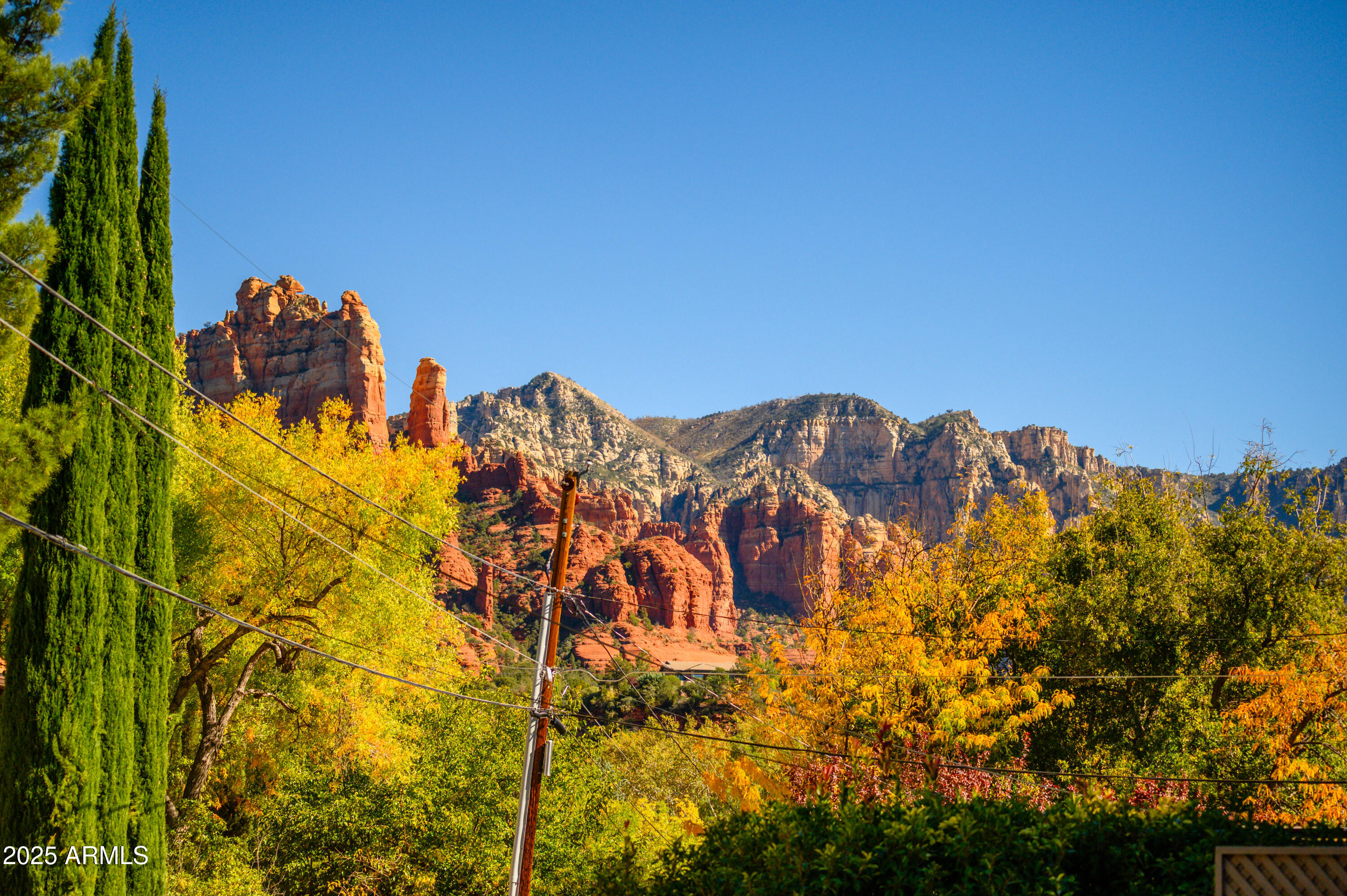 49 Prochnow Road Sedona, AZ 86336 - Photo 40 of 76 a view of a large building with a mountain in the background