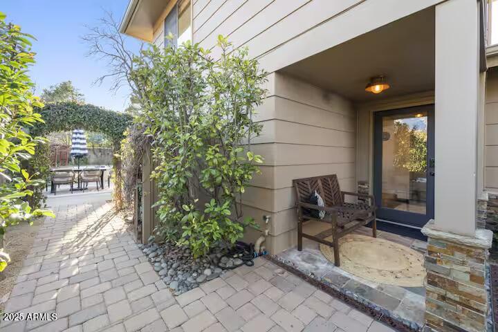 49 Prochnow Road Sedona, AZ 86336 - Photo 47 of 76 a house with potted plants in front of it