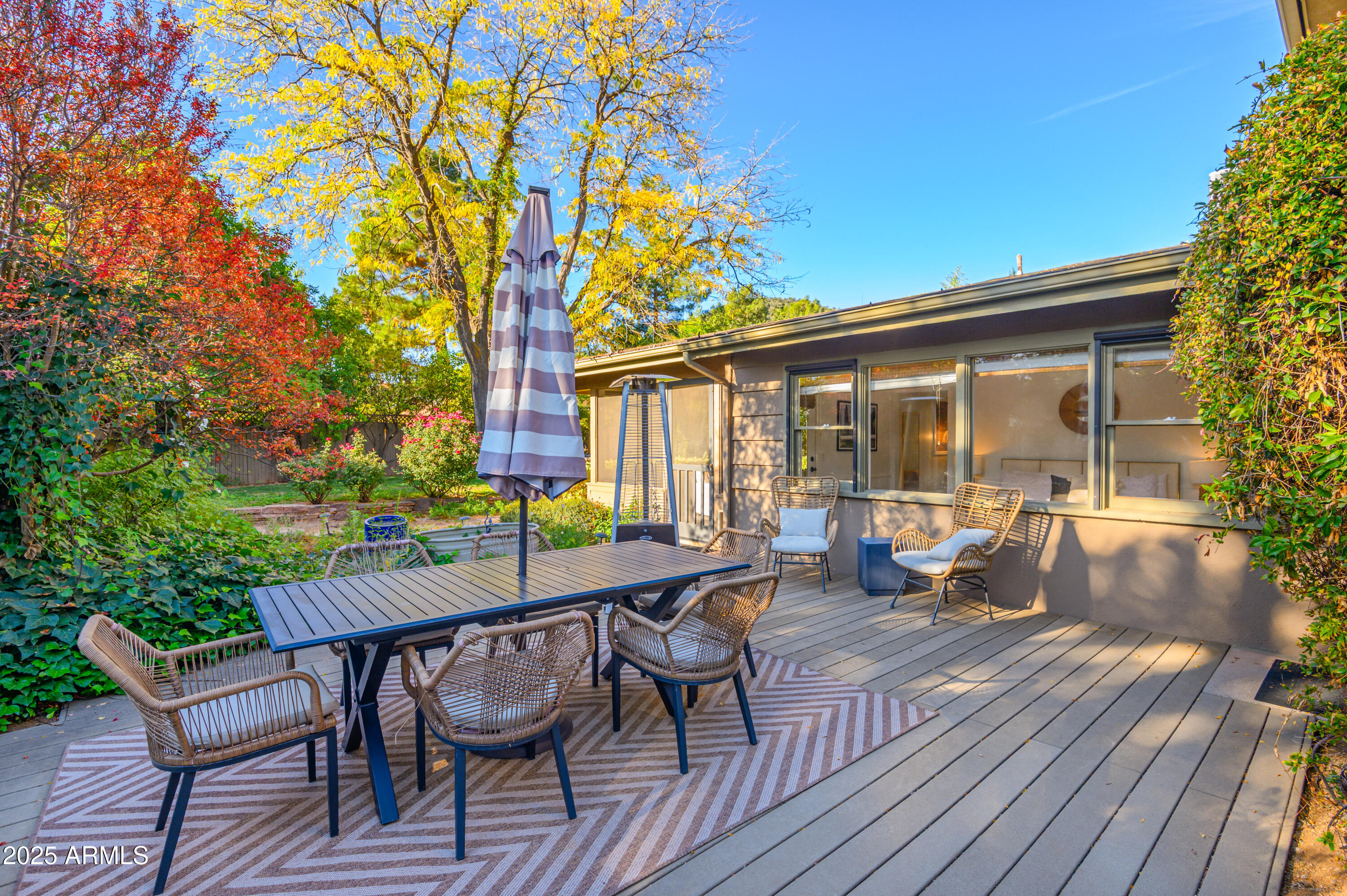 49 Prochnow Road Sedona, AZ 86336 - Photo 70 of 76 a patio with glass top table and chairs