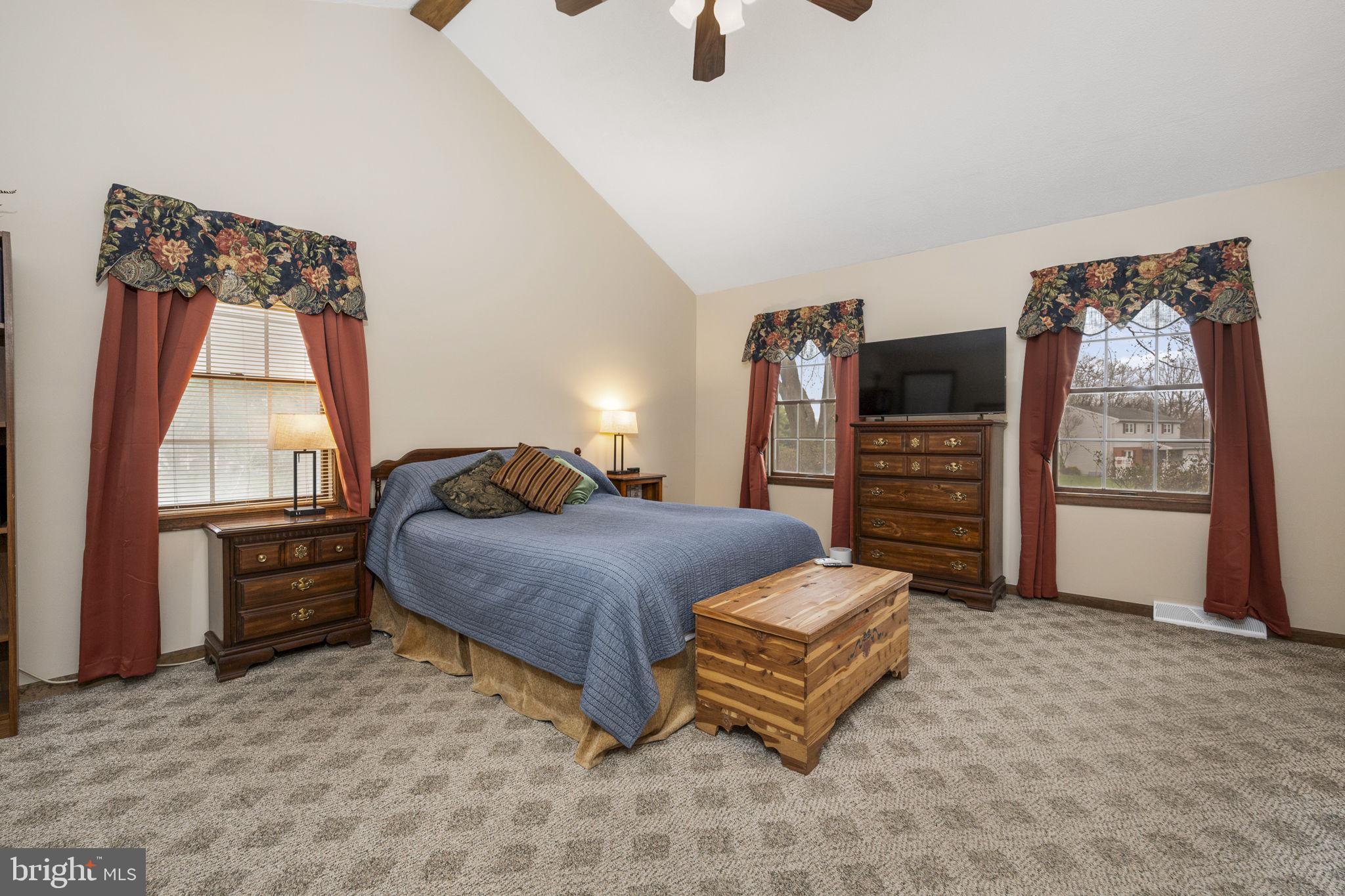 558 Crosswinds Drive Lititz, PA 17543 - Photo 12 of 31 a spacious bedroom with a bed and a window