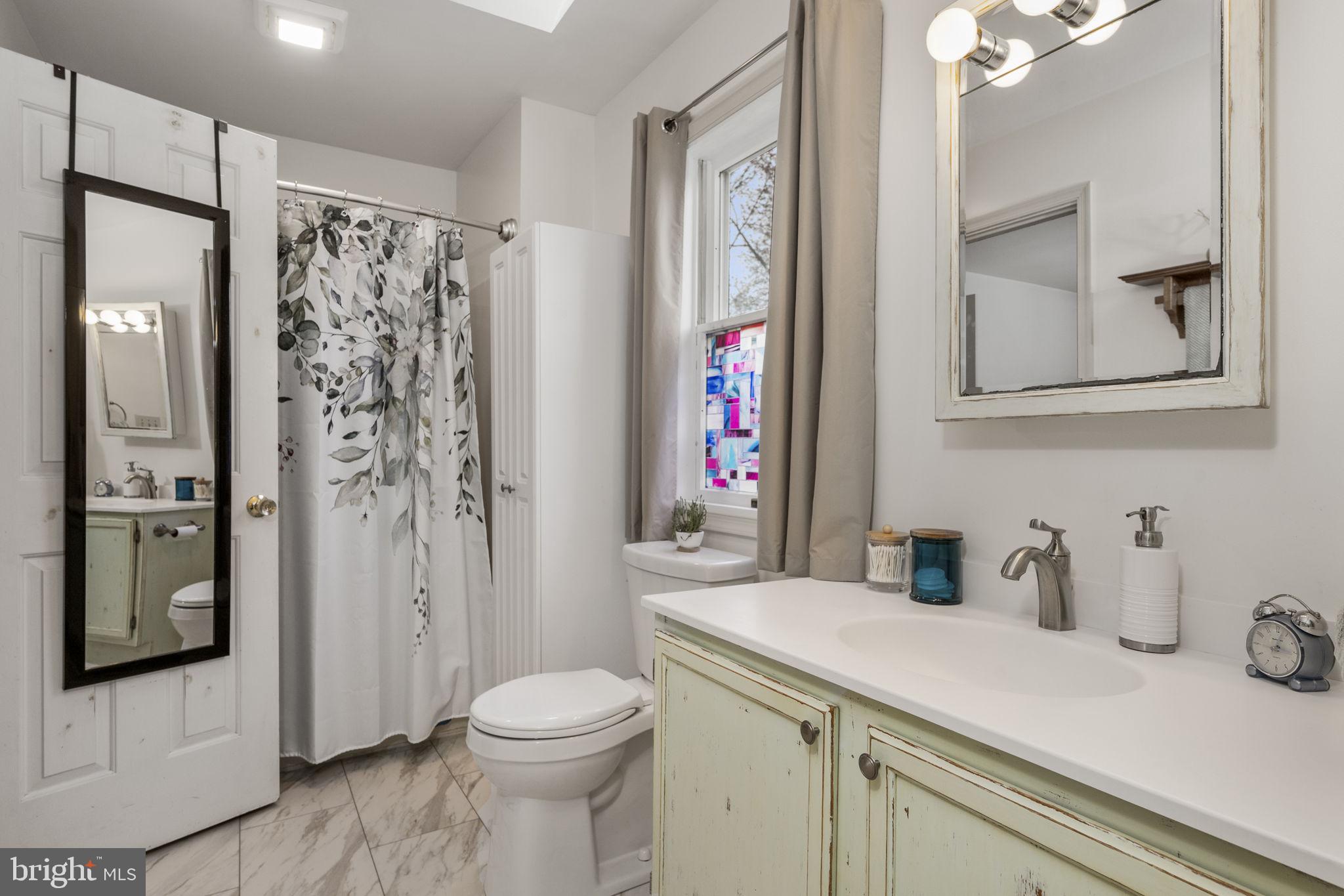 558 Crosswinds Drive Lititz, PA 17543 - Photo 17 of 31 a bathroom with a sink a toilet and shower