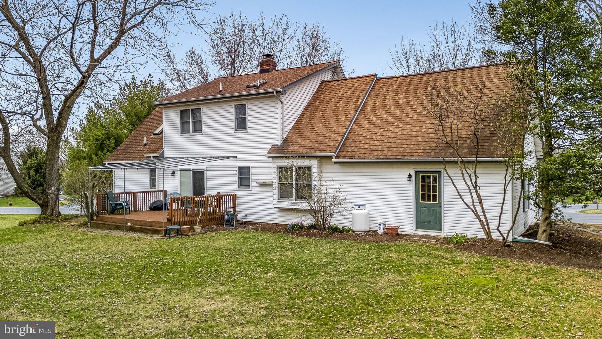 558 Crosswinds Drive Lititz, PA 17543 - Photo 23 of 31 a view of a house with backyard and sitting area