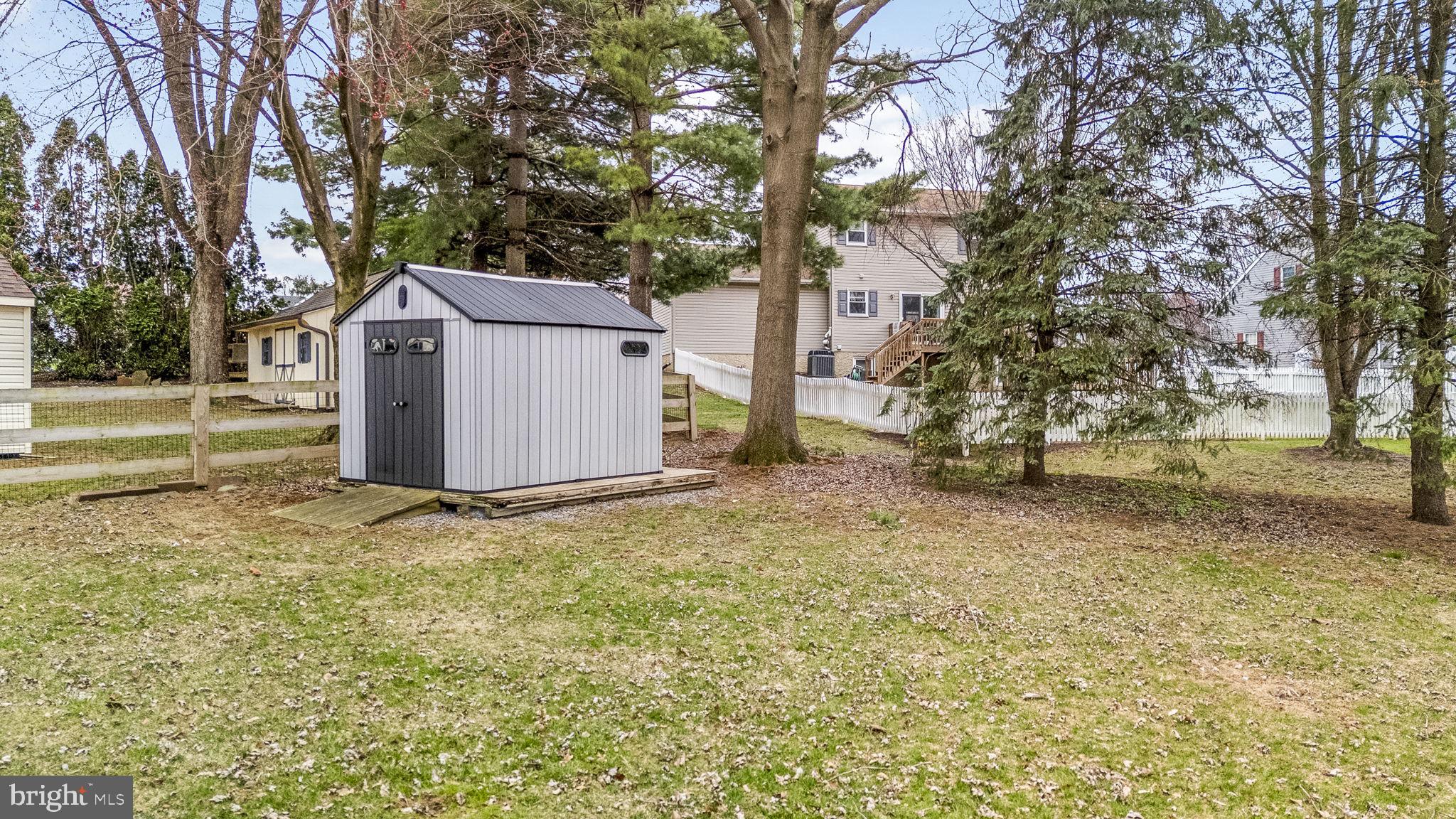558 Crosswinds Drive Lititz, PA 17543 - Photo 25 of 31 a view of a backyard with large trees