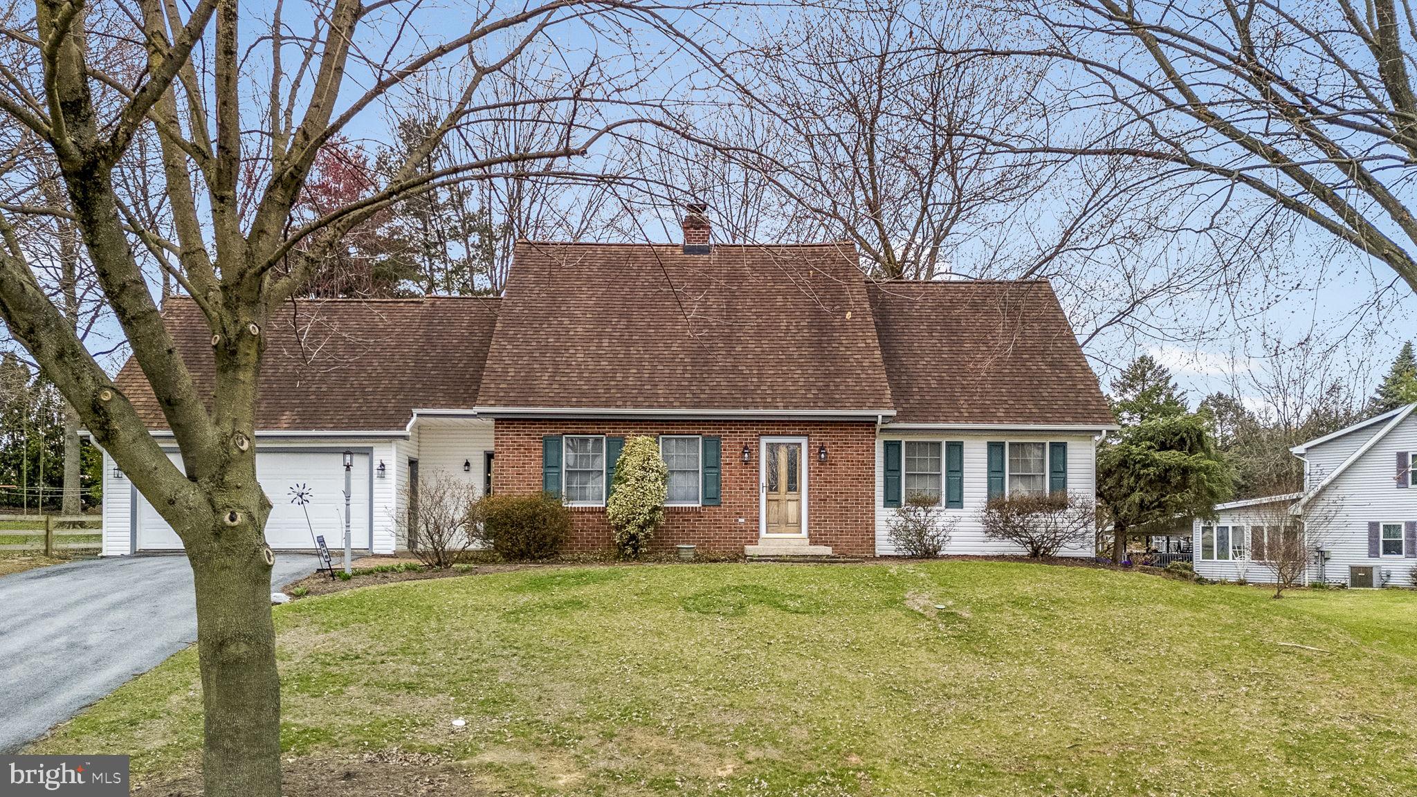 558 Crosswinds Drive Lititz, PA 17543 - Photo 26 of 31 front view of a house with a yard