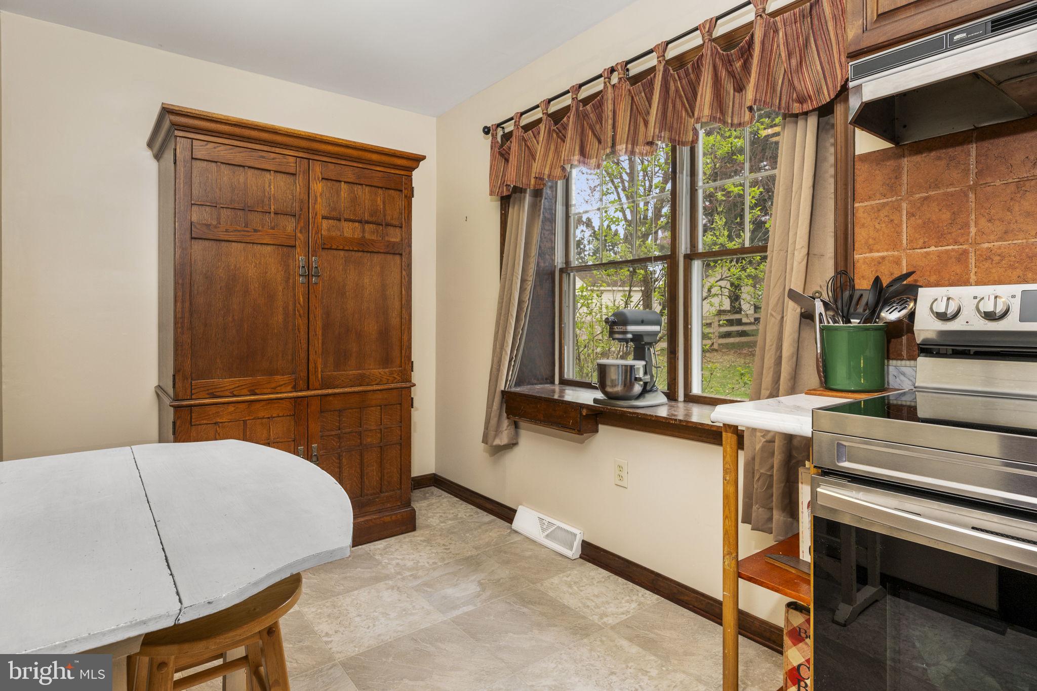 558 Crosswinds Drive Lititz, PA 17543 - Photo 10 of 31 a bedroom with a bed and a dresser next to a window
