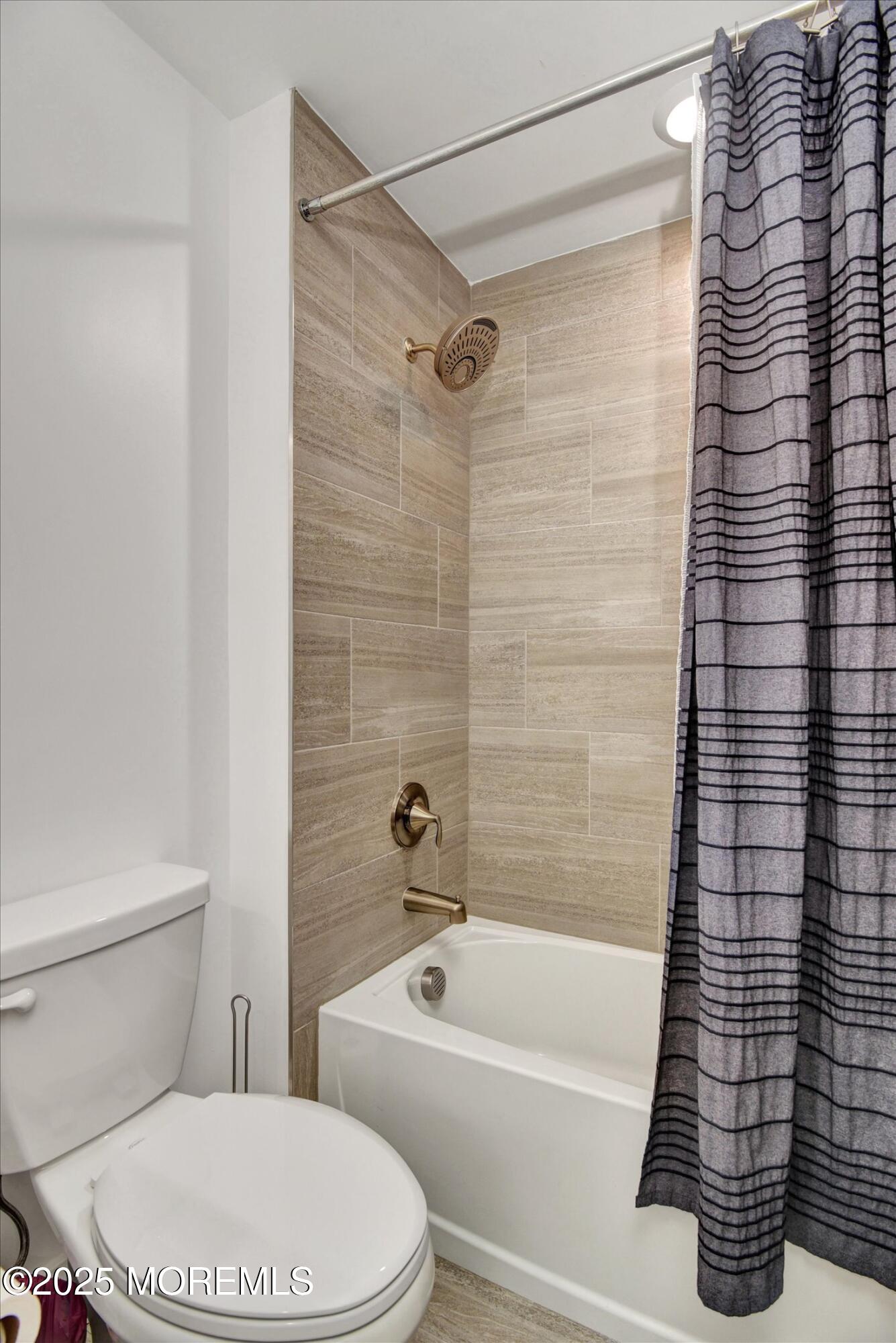 105 Pilot Street Marlboro, NJ 07746 - Photo 16 of 30 a bathroom with a toilet and a shower