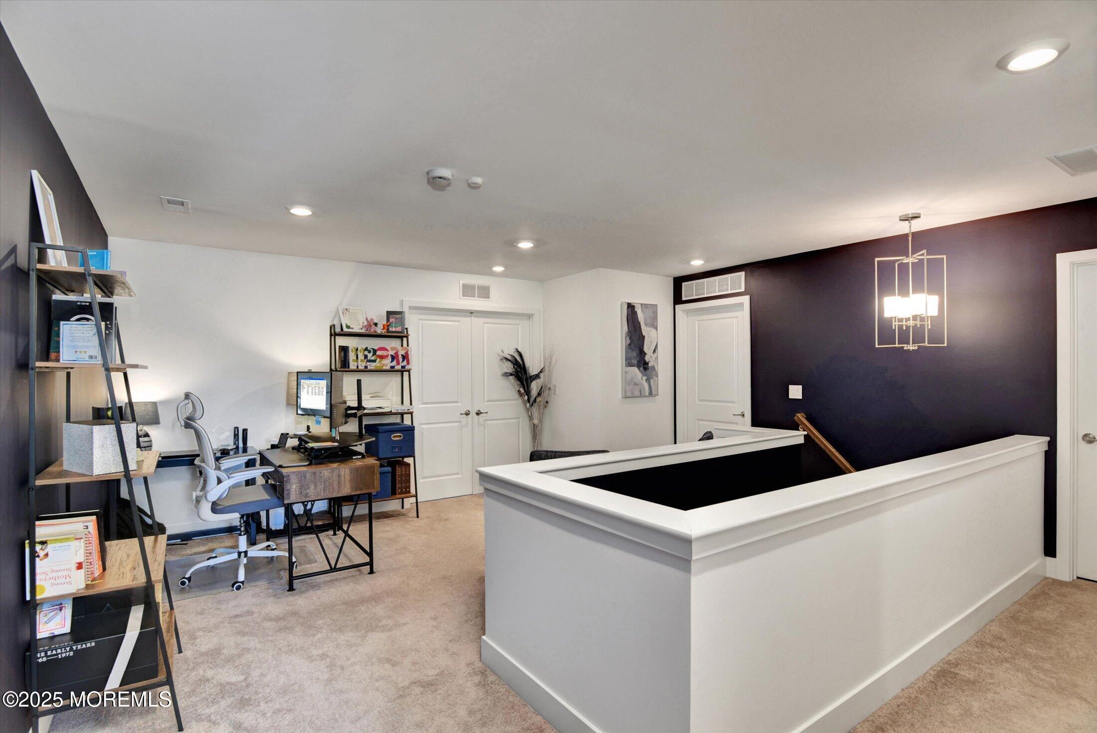 105 Pilot Street Marlboro, NJ 07746 - Photo 18 of 30 a kitchen that has a table and chairs in it