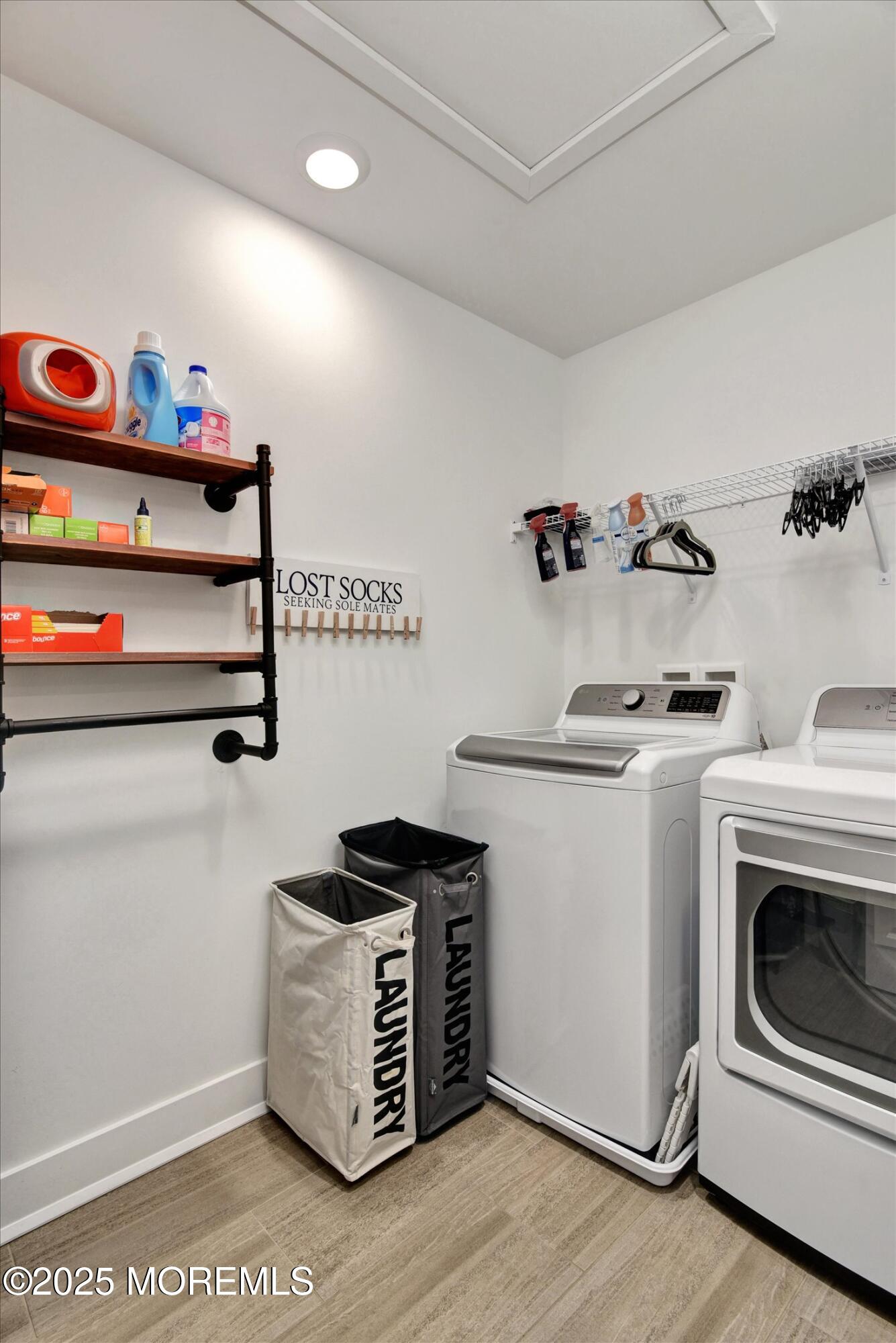 105 Pilot Street Marlboro, NJ 07746 - Photo 19 of 30 a kitchen with a refrigerator and white cabinets