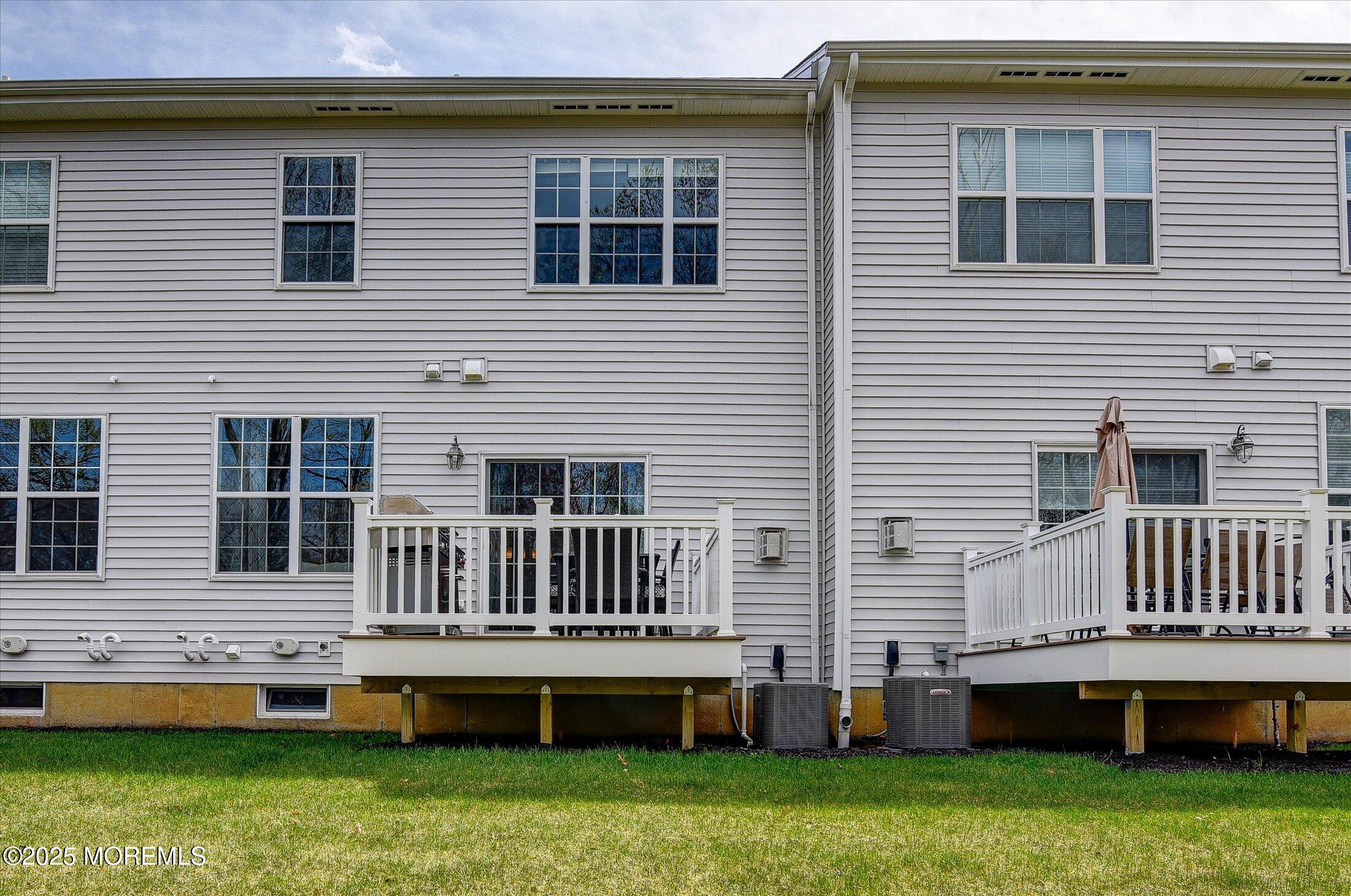 105 Pilot Street Marlboro, NJ 07746 - Photo 24 of 30 a front view of house with yard