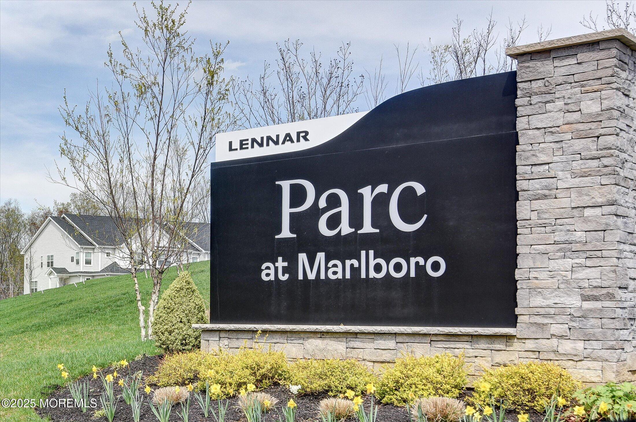 105 Pilot Street Marlboro, NJ 07746 - Photo 27 of 30 a sign that is sitting on a brick wall