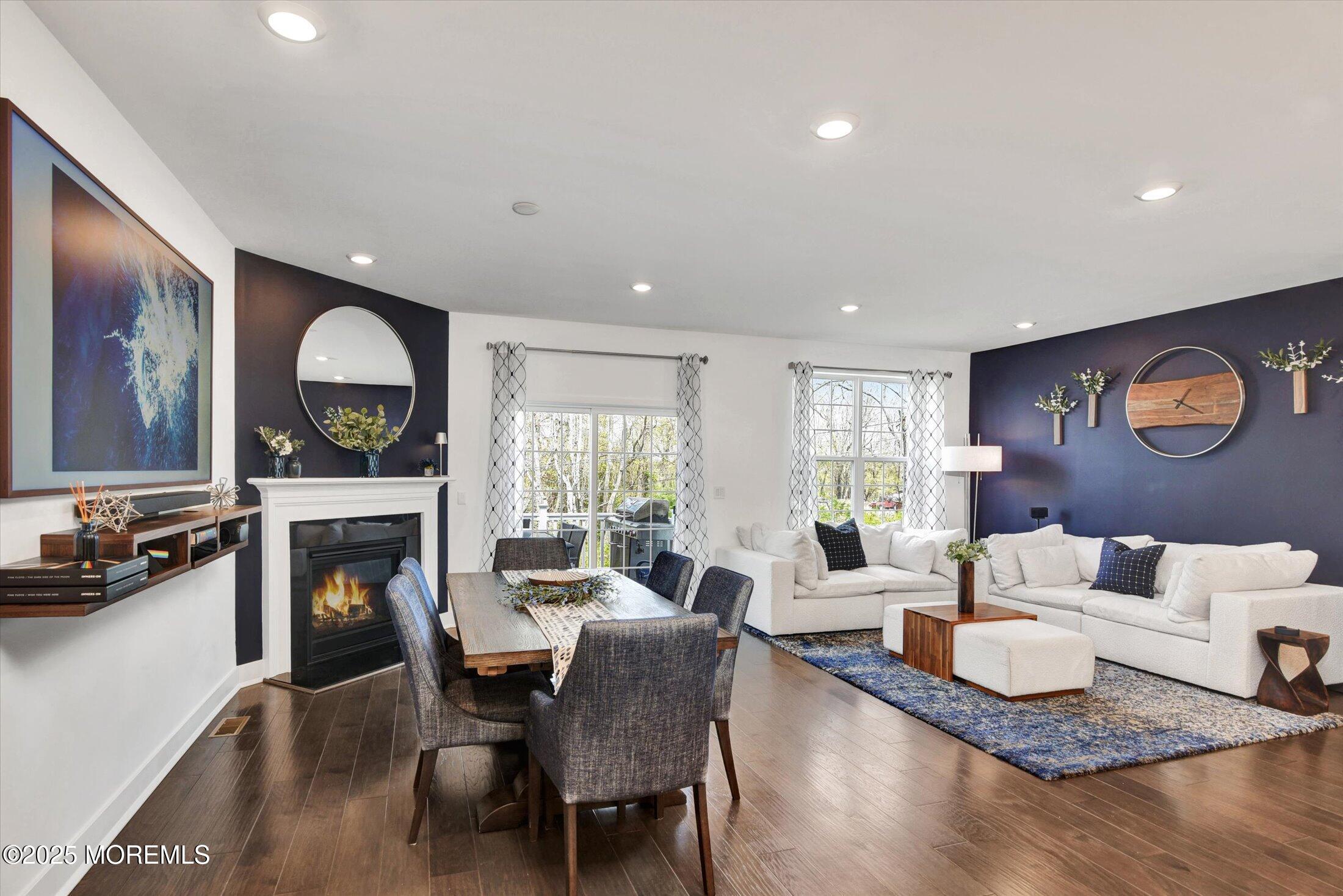 105 Pilot Street Marlboro, NJ 07746 - Photo 4 of 30 a living room with furniture fireplace and window