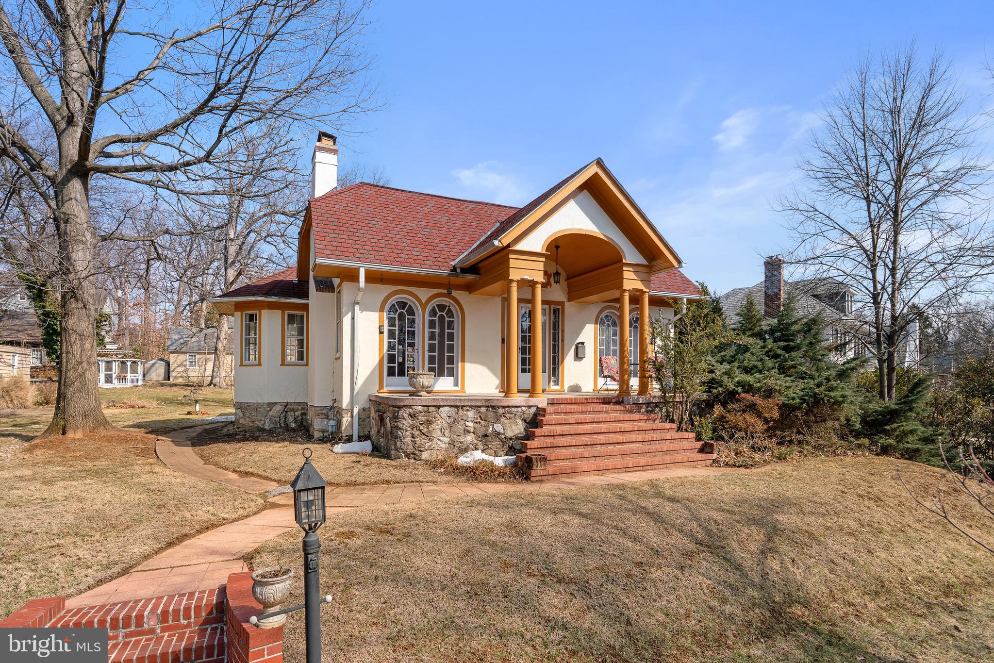 513 Stamford Road Baltimore, MD 21229 - Photo 2 of 20 a front view of a house with a yard