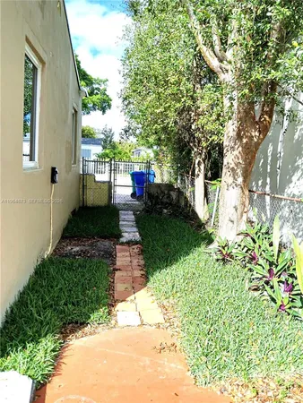 a view of yard with patio