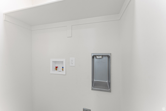 1898 West 600 South Provo, UT 84601 - Photo 17 of 32 Dedicated laundry alcove with a built-in shelf, plumbing hookups, and electrical outlets