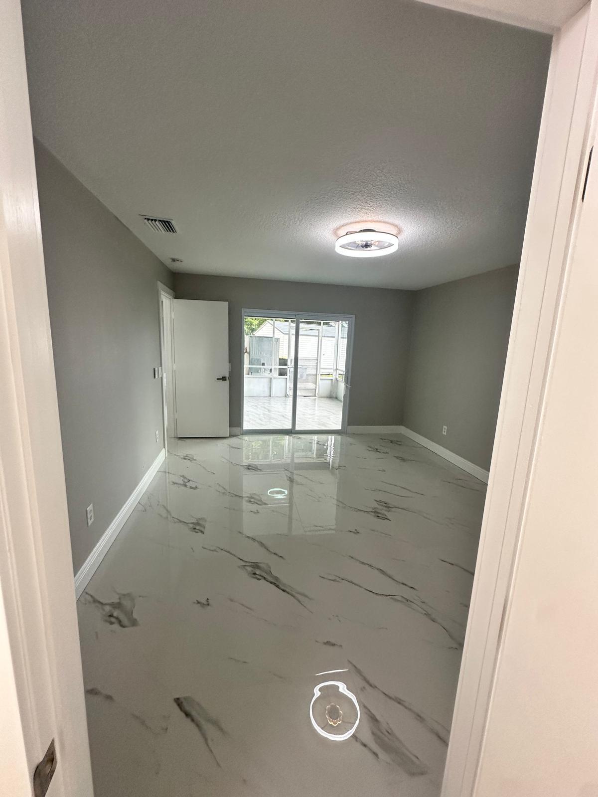 1398 Cromey Road Northeast Palm Bay, FL 32905 - Photo 20 of 36 a view of empty room with window