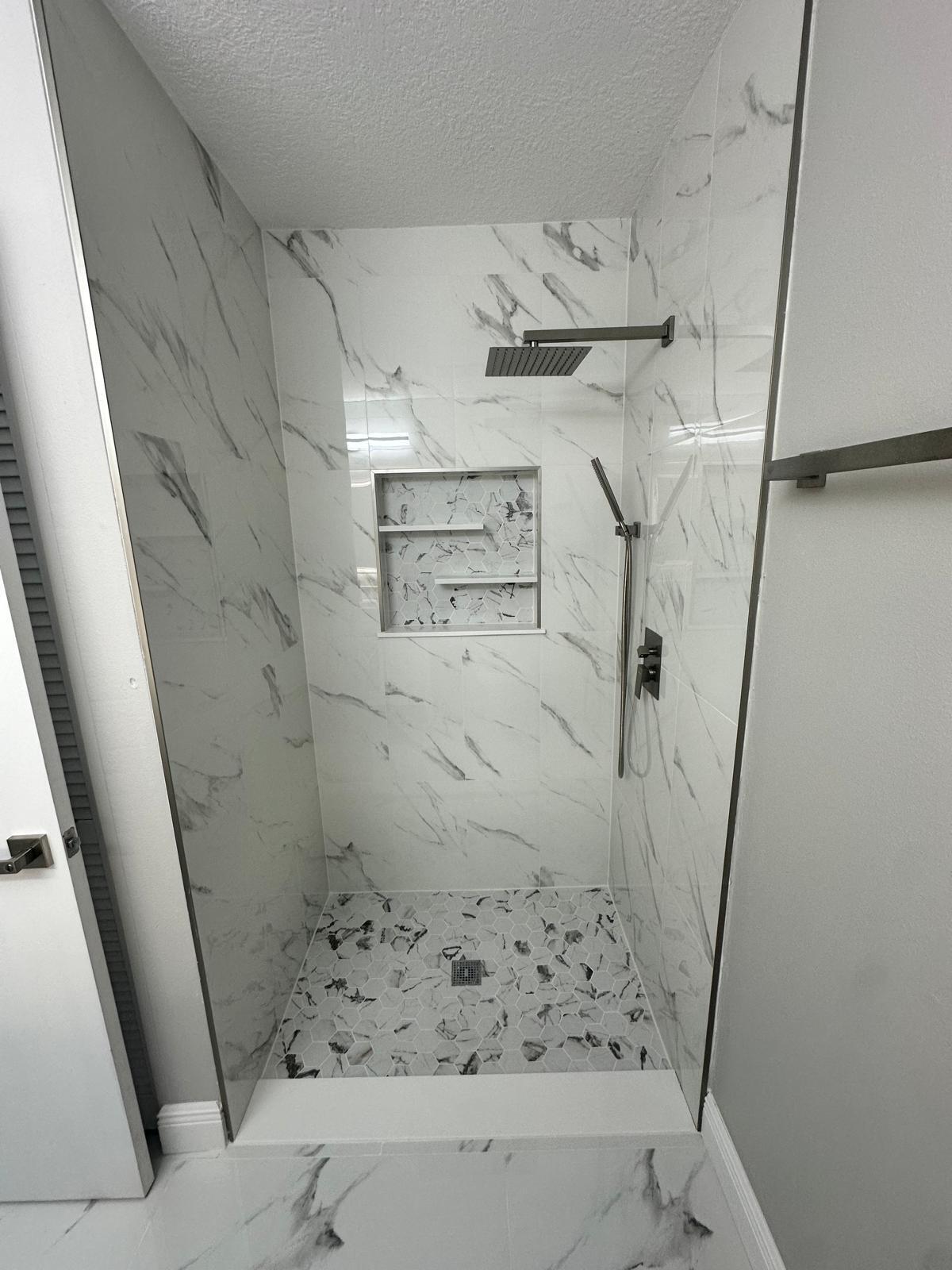 1398 Cromey Road Northeast Palm Bay, FL 32905 - Photo 29 of 36 a bathroom with a bathtub