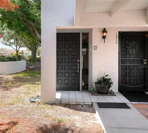 a view of a entryway door front of house