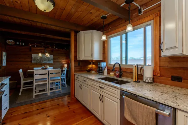 a en suite bathroom with sink and mirror