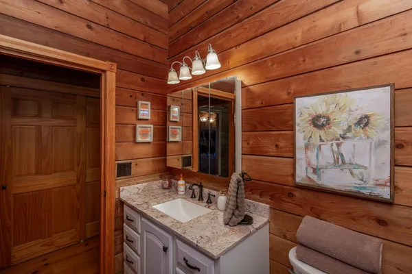 a room with pool table and flat screen tv