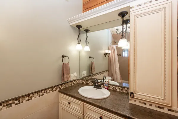 a hallway with furniture and a window