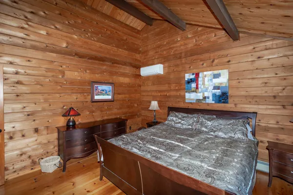 a living room with furniture a ceiling fan and a window